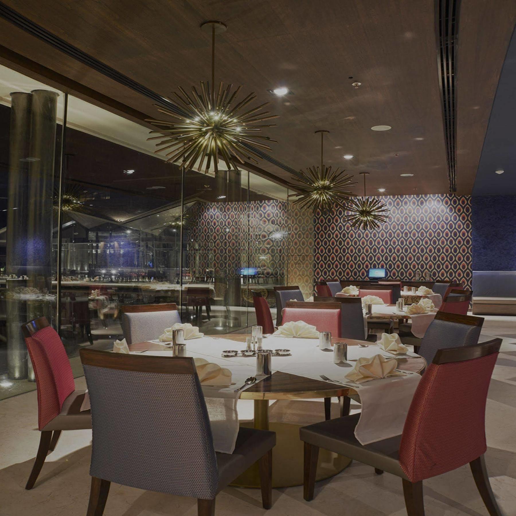 Marasa Sarovar Premiere Tirupati Esterno foto The interior of the restaurant
